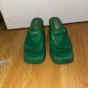 Green Steve Madden sandal with heel